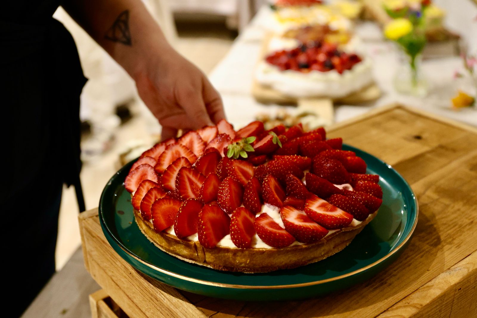 Plating a strawberry tart