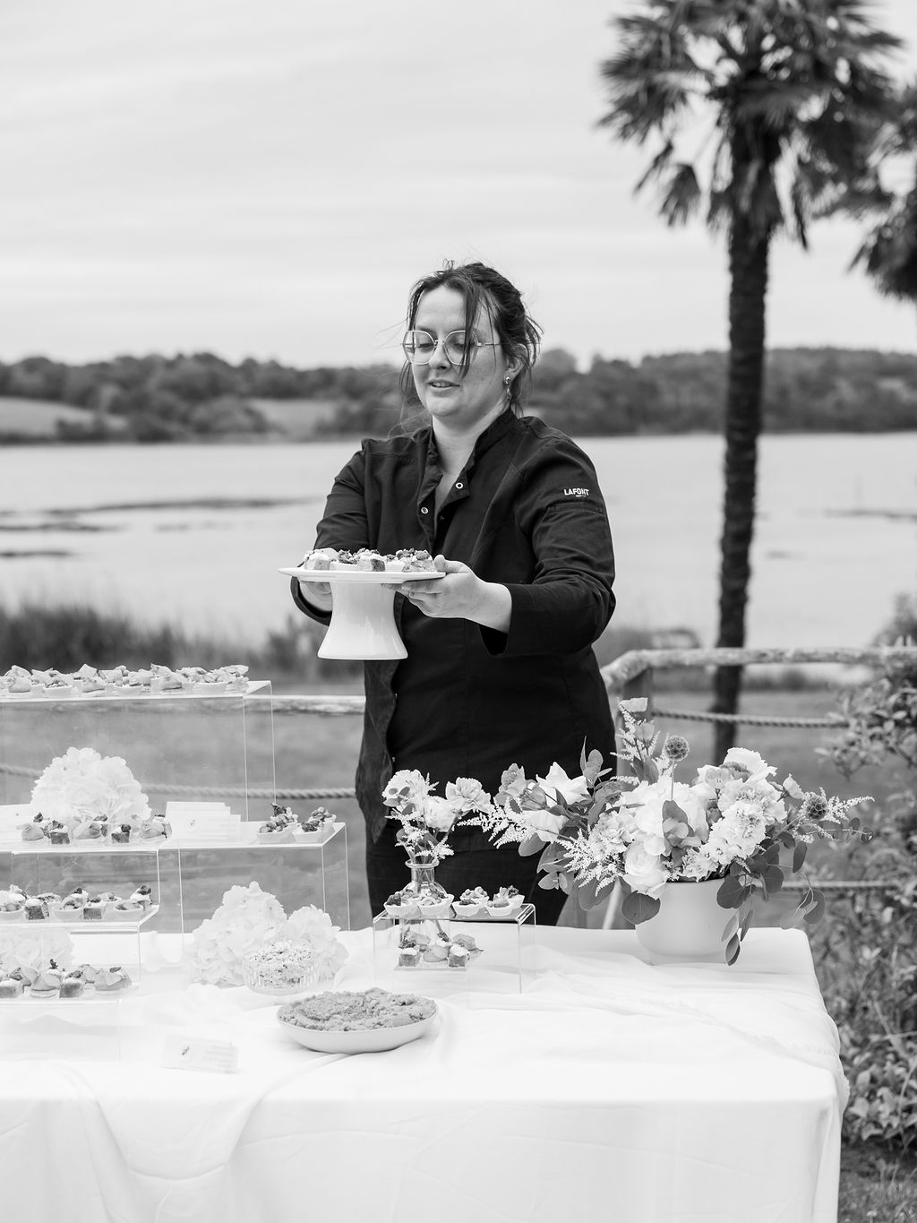 Marie presenting a dish at a reception
